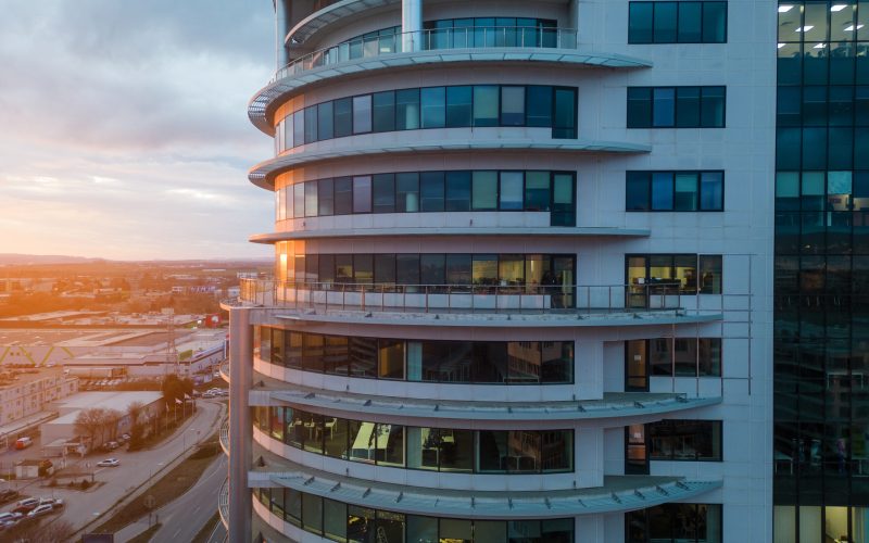 office building at night. Aerial drone flying view.